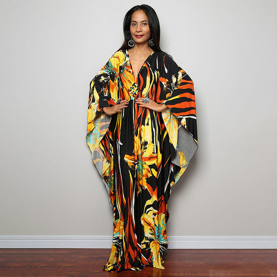 Damen Maxikleid mit kunstvollem Pfauenmuster und seitlichen Schlitzen Heidi Mode
