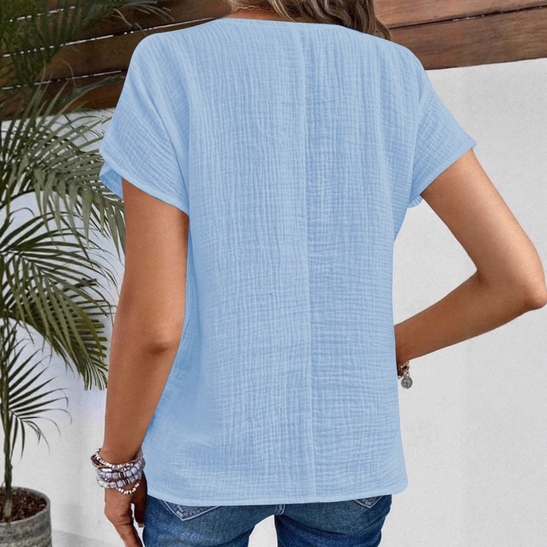 Damen Blusenshirt mit stilvollem Schalkragen und dekorativen Knopfdetails EB