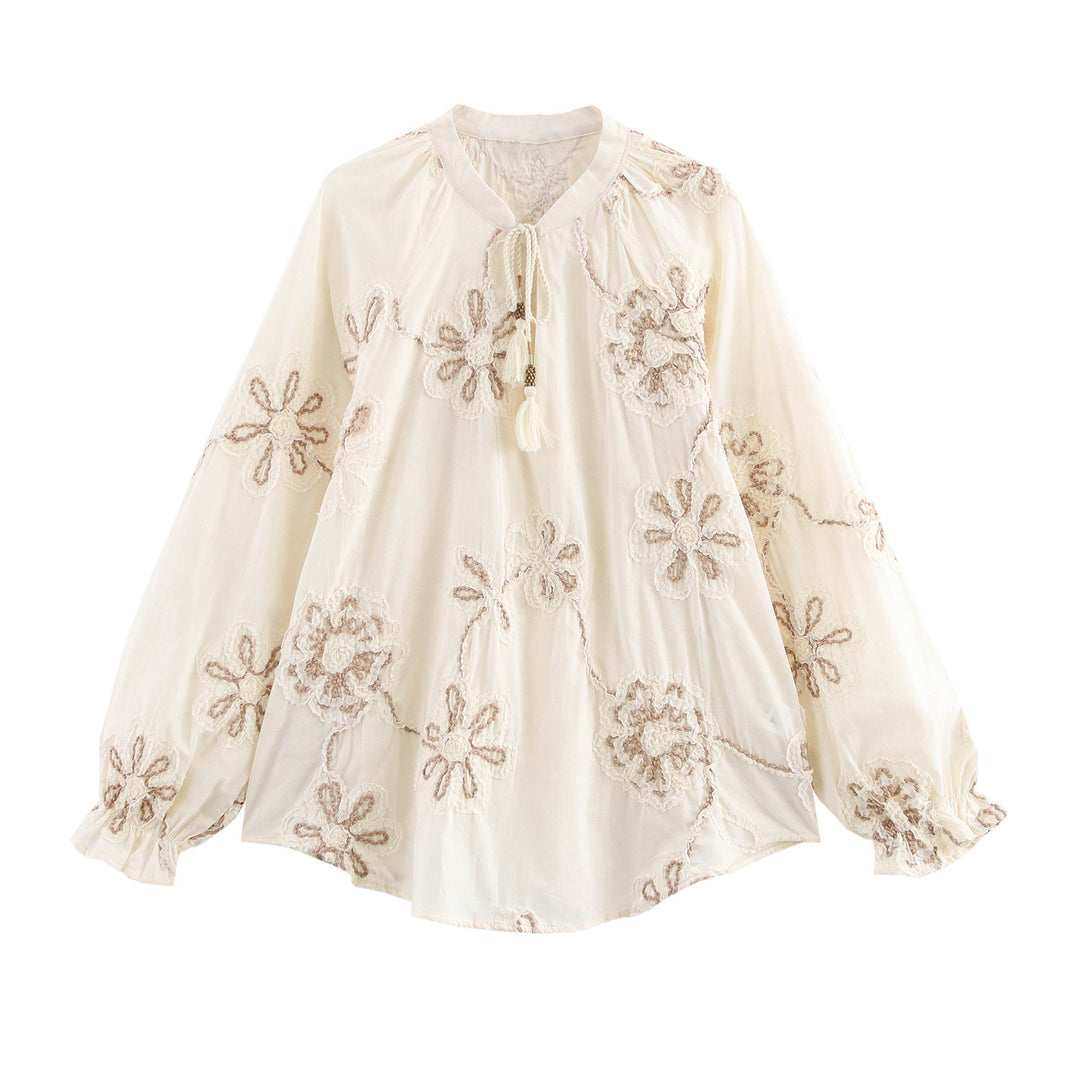 Damen Bluse mit floralem Stickmuster und eleganten Quasten EB