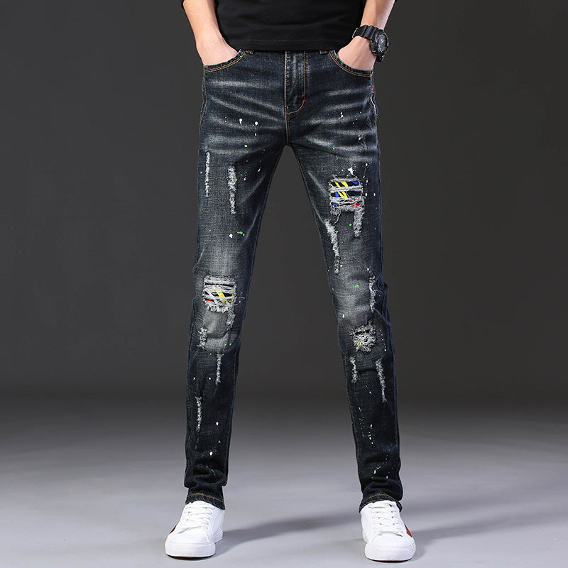 Herren Slim Fit Jeans mit kreativen Rissdesign und Farbklecksen EB