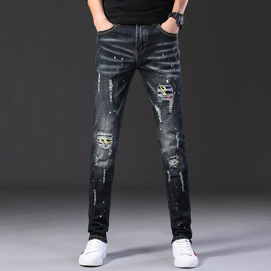 Herren Slim Fit Jeans mit kreativen Rissdesign und Farbklecksen EB