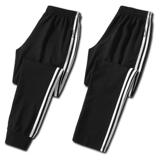 Herren Slim-Fit Trackhose mit seitlichen Kontraststreifen, Reißverschlusstaschen und elastischem Bund EB