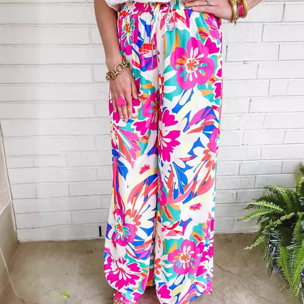 Damen weite Palazzo-Hose mit buntem Blumenmuster und elastischem Bund EB