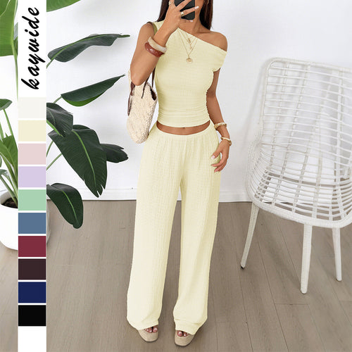 Damen Zweiteiliges Set aus elastischem Rippstoff mit asymmetrischem Top und weitem Hosen EB