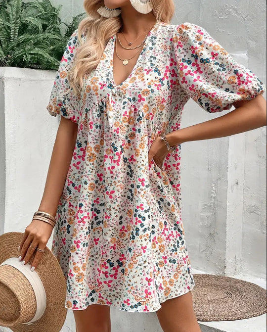 Damen Verspieltes Blümchenkleid mit Puffärmeln und V-Ausschnitt EB
