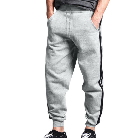 Herren Relaxed-Fit Jogginghose mit seitlichem Kontraststreifen, Elastikbund & Kordelzug EB