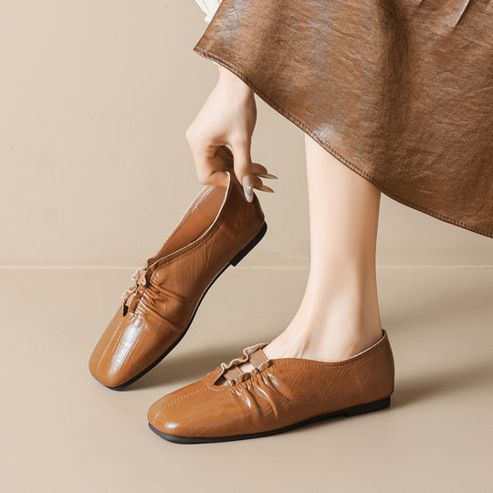 Damen Freizeitliche Slipper mit modischer Faltenoptik EB