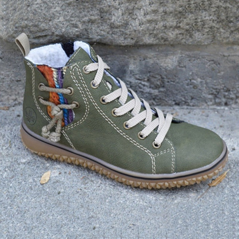 Damen High-Top Sneaker-Boot mit seitlichem Reißverschluss, dekorativem Knöchelriemen und profilierter Gummisohle EB