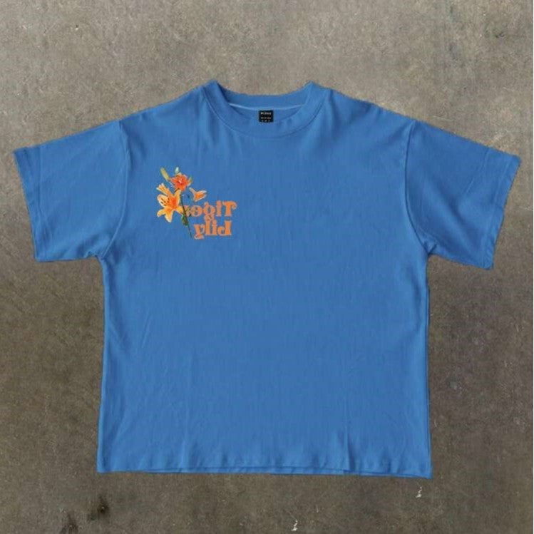Damen T-Shirt mit künstlerischem floralem Druck und verspieltem Schriftzug EB