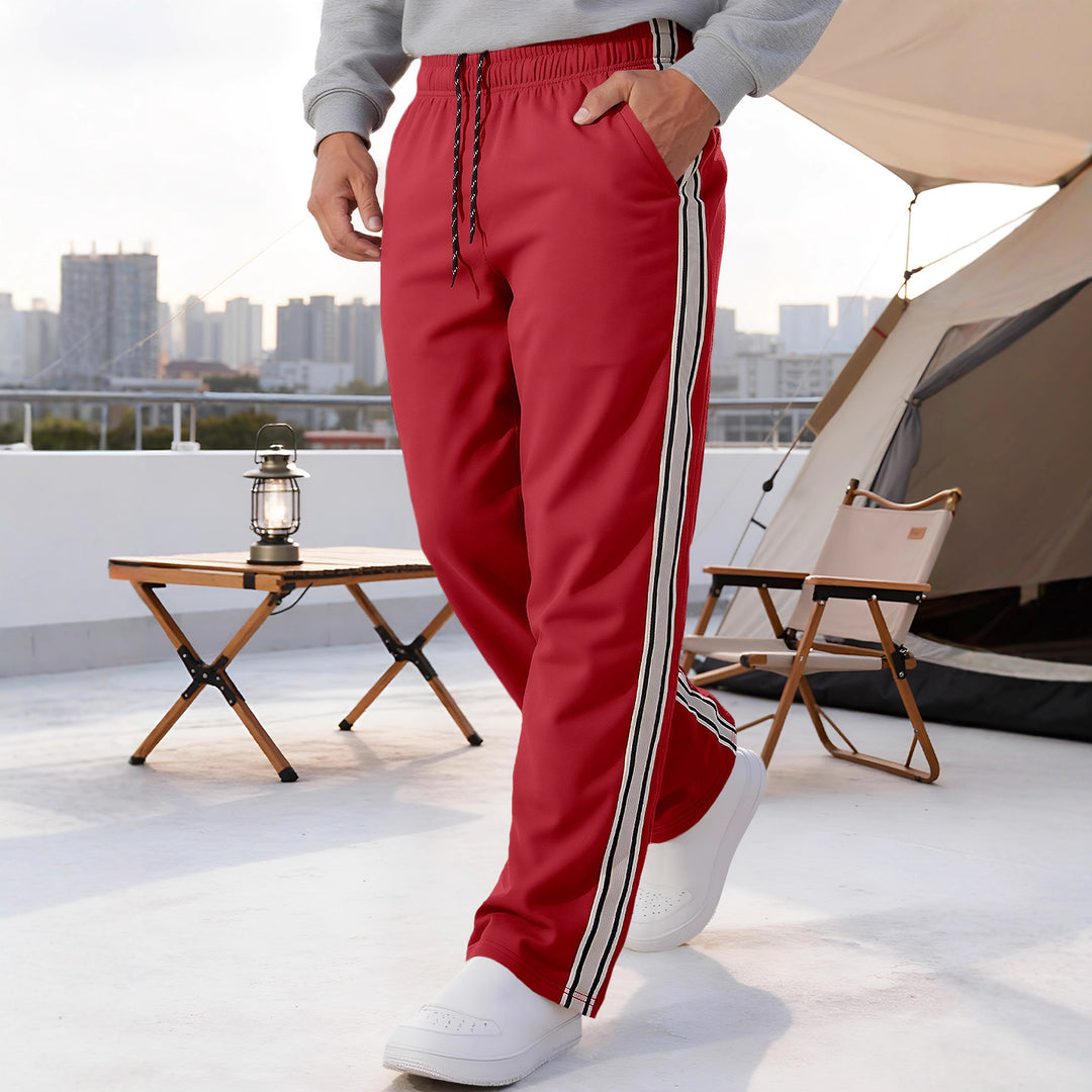 Herren nan Retro-Trackhose mit schmal zulaufendem Bein elastischem Bund Tunnelzug und seitlichen Streifen EB