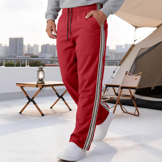 Herren nan Retro-Trackhose mit schmal zulaufendem Bein elastischem Bund Tunnelzug und seitlichen Streifen EB