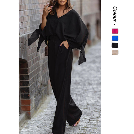 Damen Eleganter Jumpsuit mit weiten Ärmeln und schmalem Taillengürtel EB