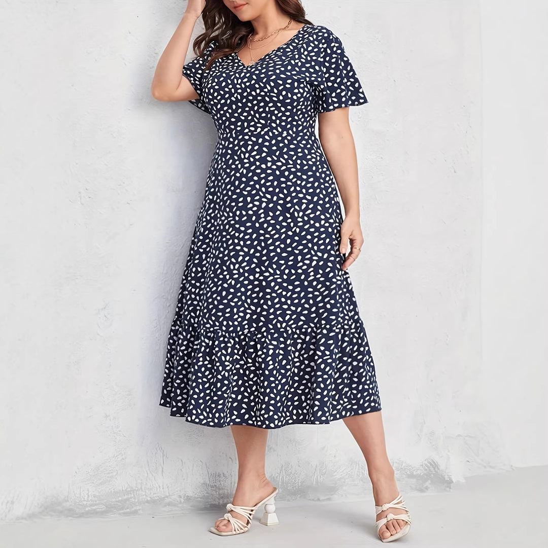 Damen Midi-Kleid mit fließendem Schnitt und verspieltem Muster EB