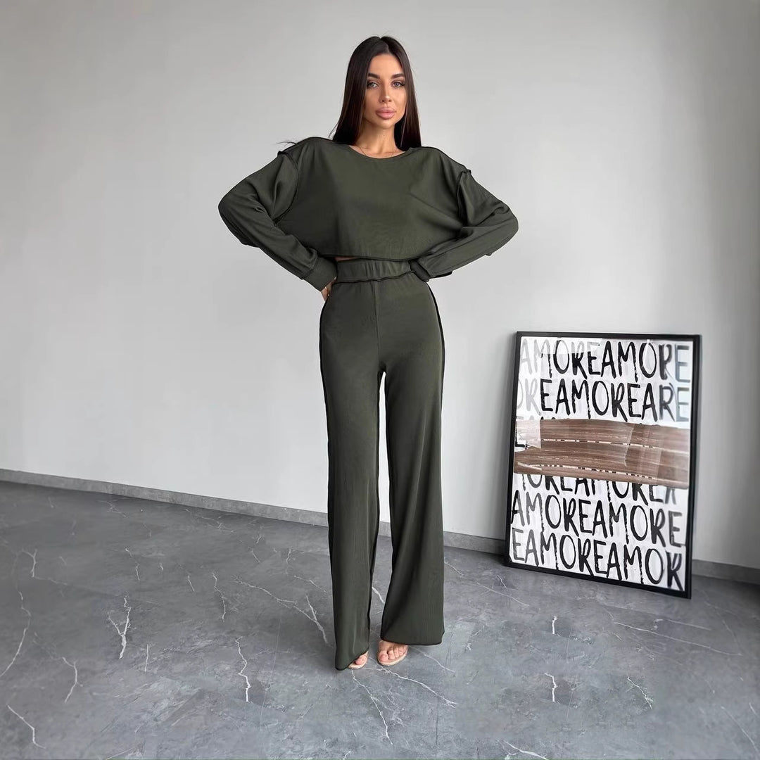 Damen Cropped Oversized-Sweatshirt mit Overlocknähten und High-Waist ausgestellter Hose Set Eichborn Berlin