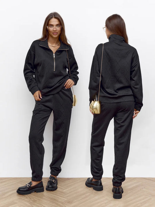 Damen Zopfstrick-Lounge-Set mit halbem Reißverschluss und hochtaillierter Jogginghose Eichborn Berlin