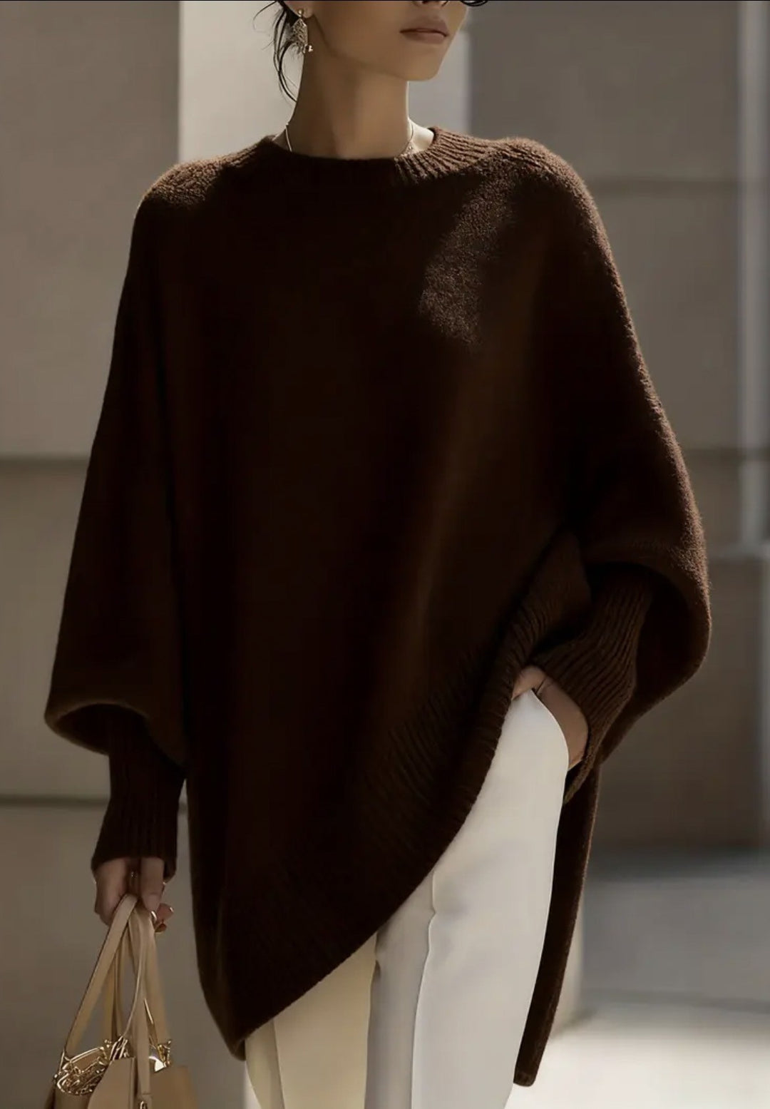 Damen nan Oversize Strickponcho mit asymmetrischem Saum und gerippten Ärmeln EB