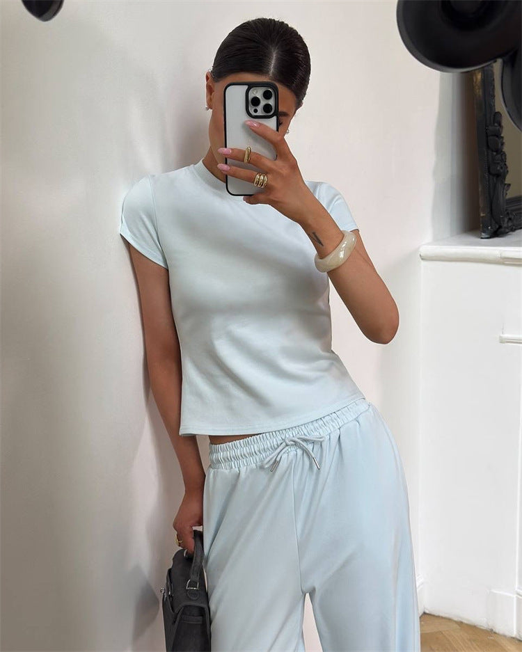 Damen figurnahes Kurzarm-Rippshirt und elastische High-Waist-Loungehose Set Eichborn Berlin