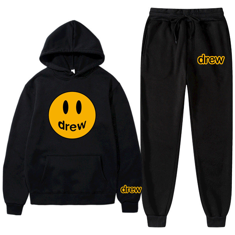 Unisex nan zweiteiliges Lounge-Set aus French-Terry mit Smiley-Print Kapuzenpullover und tapered Jogginghose EB