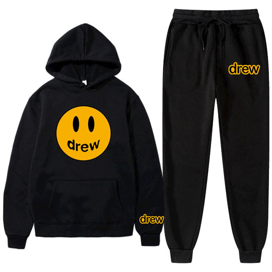 Unisex nan zweiteiliges Lounge-Set aus French-Terry mit Smiley-Print Kapuzenpullover und tapered Jogginghose EB