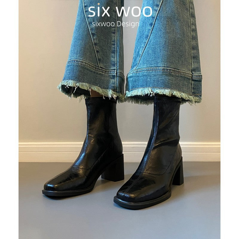 Damen Stiefeletten mit hohem Blockabsatz und eleganter Silhouette EB