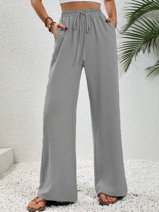 Damen Lässige, Breite Freizeithose mit Elastischem Bund und Seitlichen Taschen EB