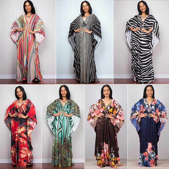 Damen Maxikleid mit kunstvollem Pfauenmuster und seitlichen Schlitzen Heidi Mode