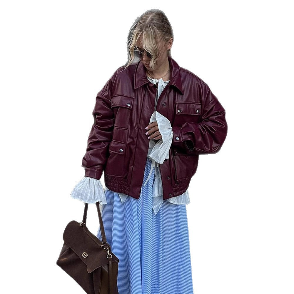 Damen oversized Kunstlederjacke mit funktionalen Taschen und elastischem Bund EB