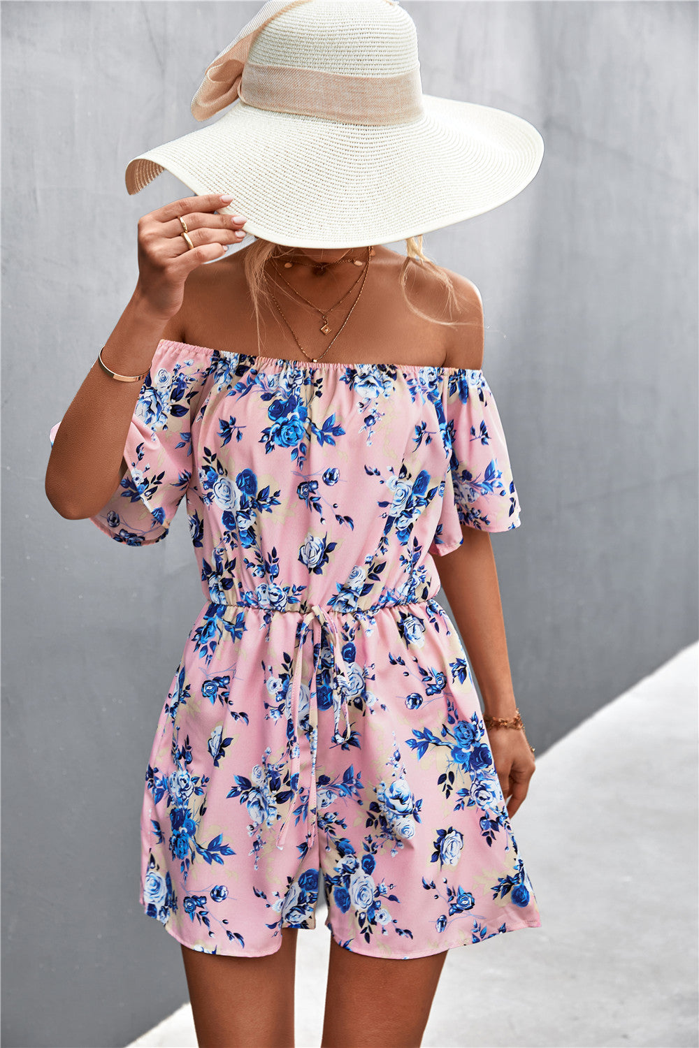 Damen Off-Shoulder Jumpsuit mit floralem Design und elastischem Taillenbund EB
