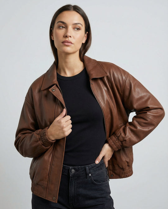 Damen grainierte Nappa-Optik Blousonjacke mit Hemdkragen elastischem Saum und verdeckter Druckknopfleiste EB