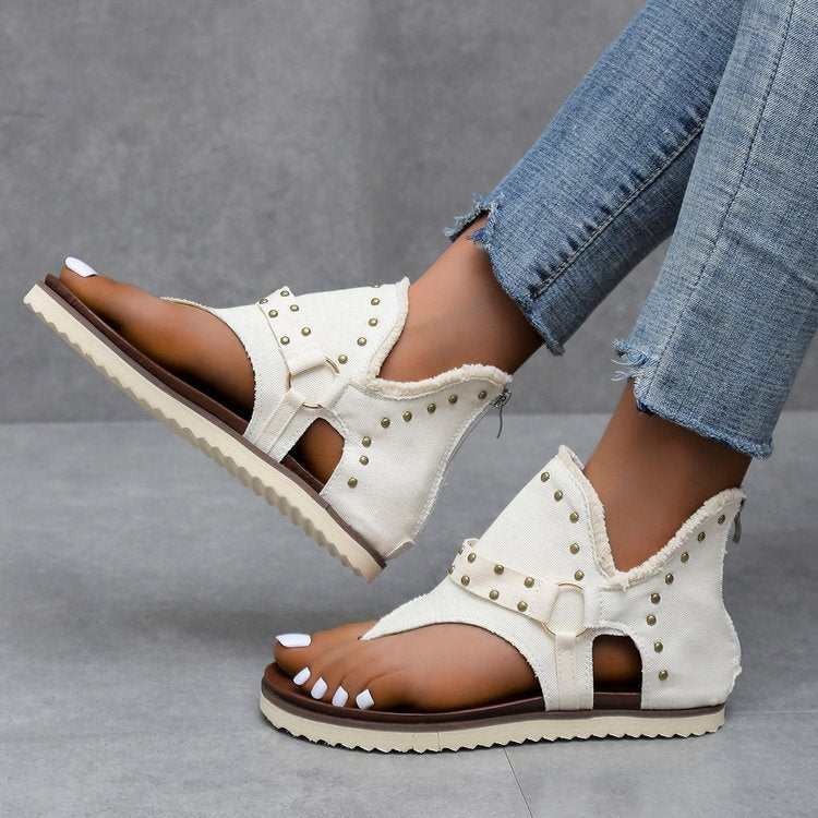 Damen Elegante und komfortable Zehentrenner-Sandalen mit modischen Nieten EB