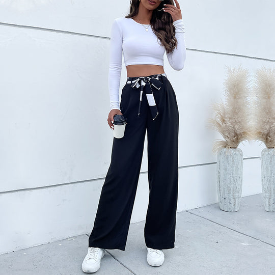 Damen weite Stoffhose mit Bindegürtel und seitlichen Taschen EB