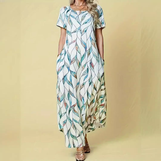 Damen Maxikleid mit elegantem Blattmuster und praktischen Taschen EB