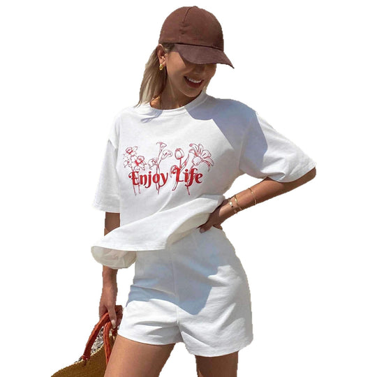 Damen Lässiges Oversize-T-Shirt mit floralem Druck und inspirierendem Schriftzug EB