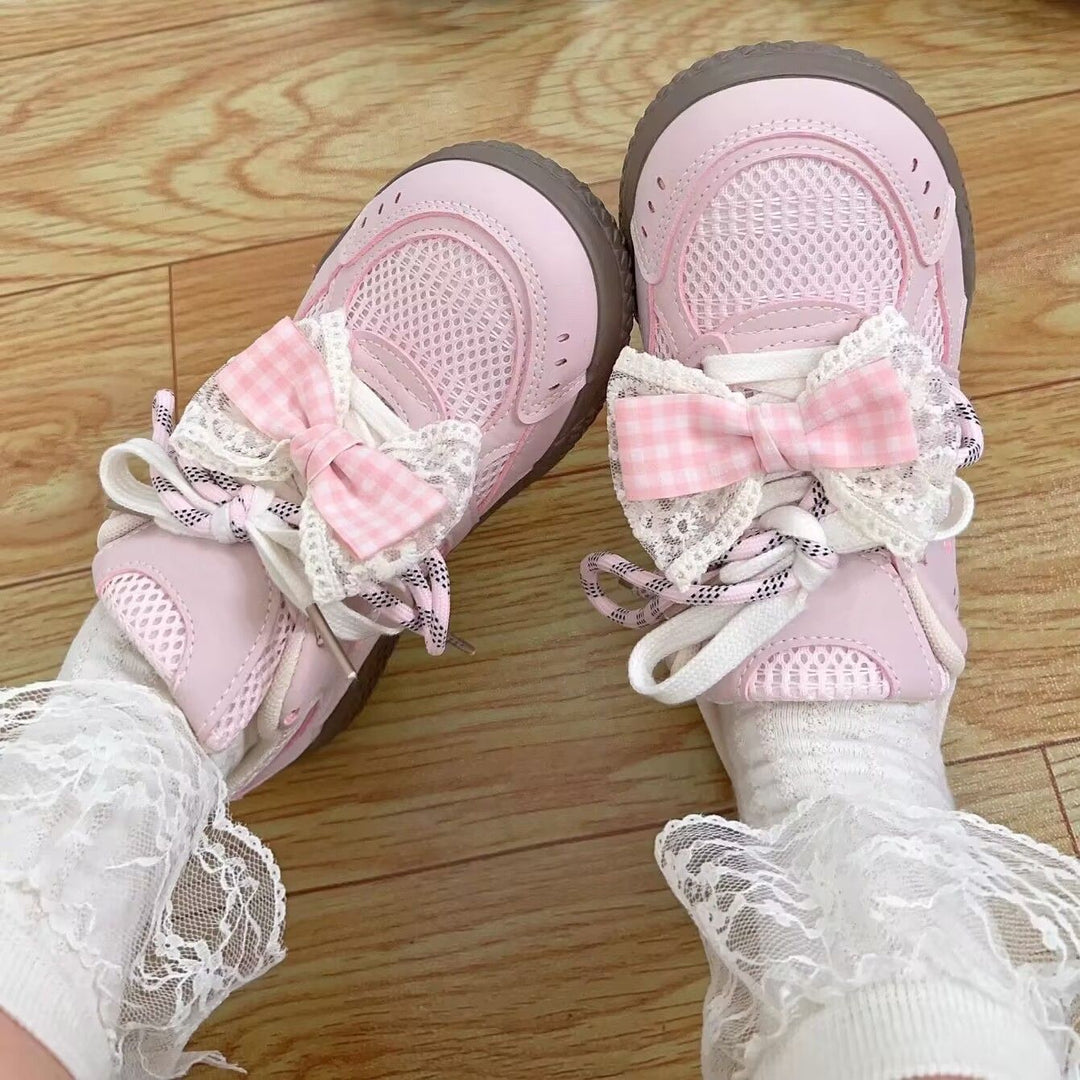 Damen Sneaker mit dekorativen Schleifen und atmungsaktiven Netzstrukturen EB