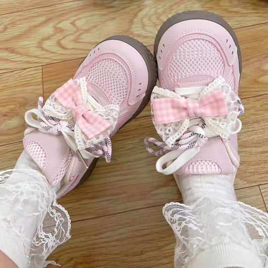 Damen Sneaker mit dekorativen Schleifen und atmungsaktiven Netzstrukturen EB