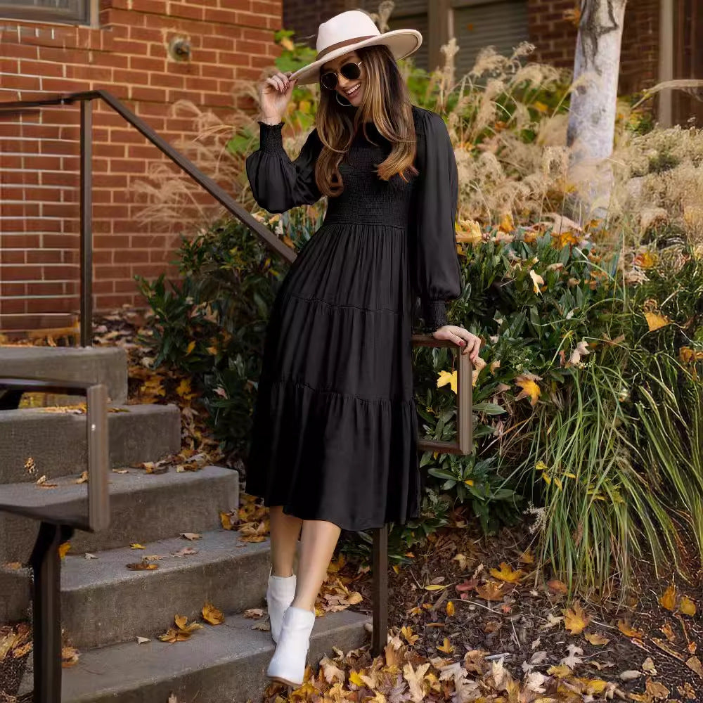 Damen Maxikleid mit schickem Smock-Oberteil und voluminösen Puffärmeln EB