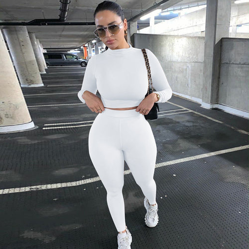 Damen Sportliches Set mit hochgeschlossenem Oberteil und enganliegenden Leggings EB