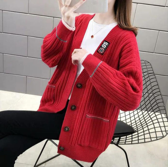 Damen Strickjacke mit strukturiertem Rippmuster und praktischen Taschen EB