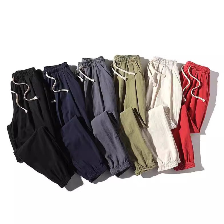 Herren nan lockere Jogginghose mit elastischem Bund, Kordelzug, Seitentaschen und elastischen Bündchen EB