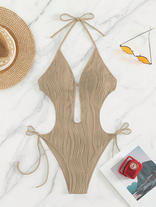 Damen Einteiliger Badeanzug mit raffiniertem Cut-Out und stylischem Wellenmuster EB