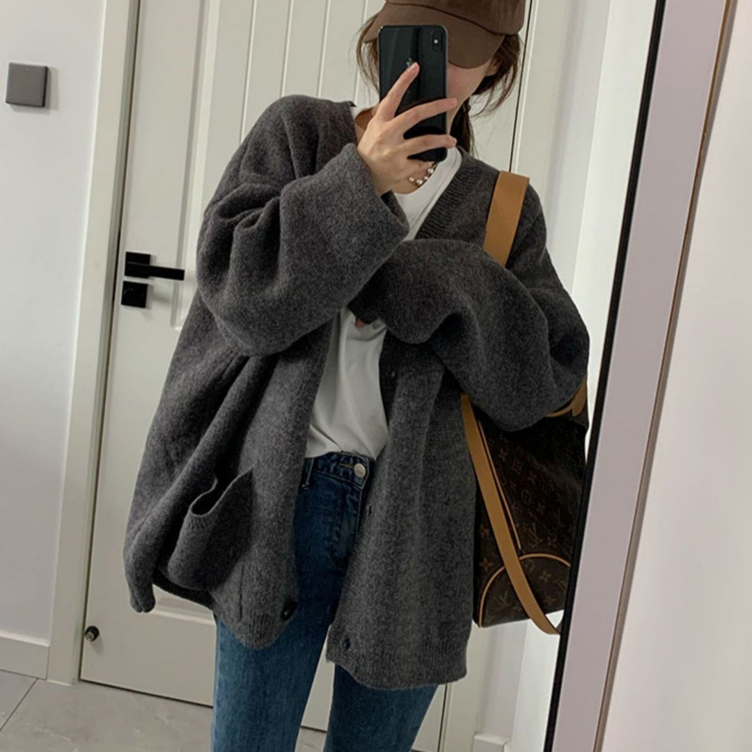 Damen Gemütliche Strickjacke mit weiten Ärmeln und praktischen Taschen EB