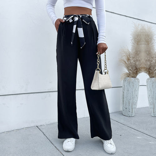 Damen weite Stoffhose mit Bindegürtel und seitlichen Taschen EB