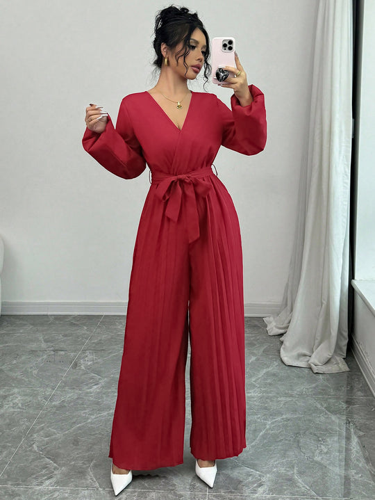 Damen Eleganter Jumpsuit mit taillierbarem Gürtel und plissiertem Schnitt EB
