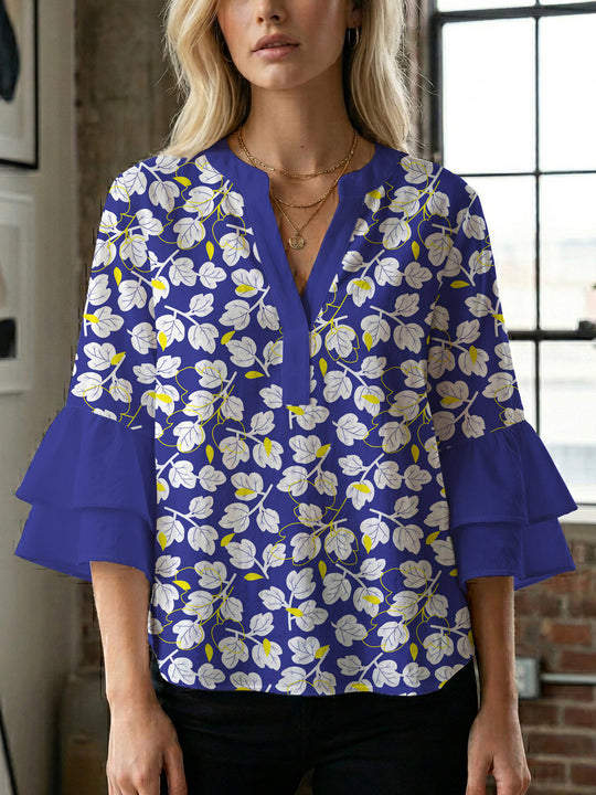 Damen Bluse mit voluminösen Ärmeln und floralem Design EB
