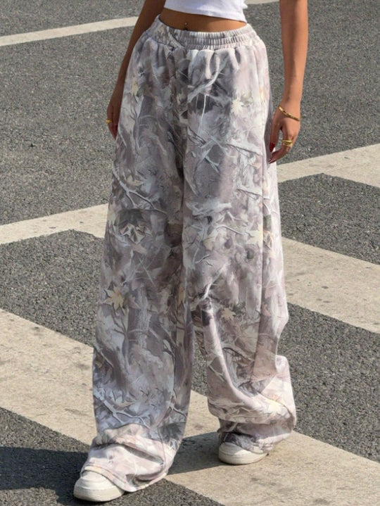 Damen nan weite Palazzo-Hose mit floralem Alloverprint und elastischem Bund EB