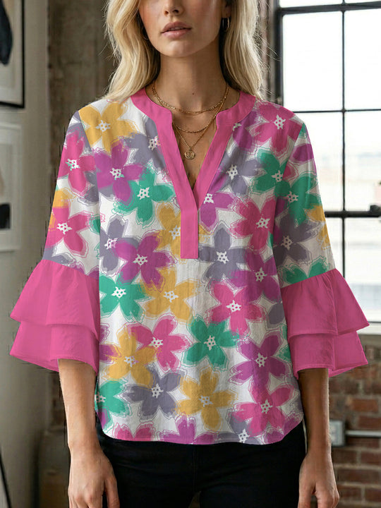 Damen Bluse mit voluminösen Ärmeln und floralem Design EB