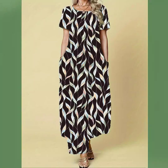 Damen Maxikleid mit elegantem Blattmuster und praktischen Taschen EB