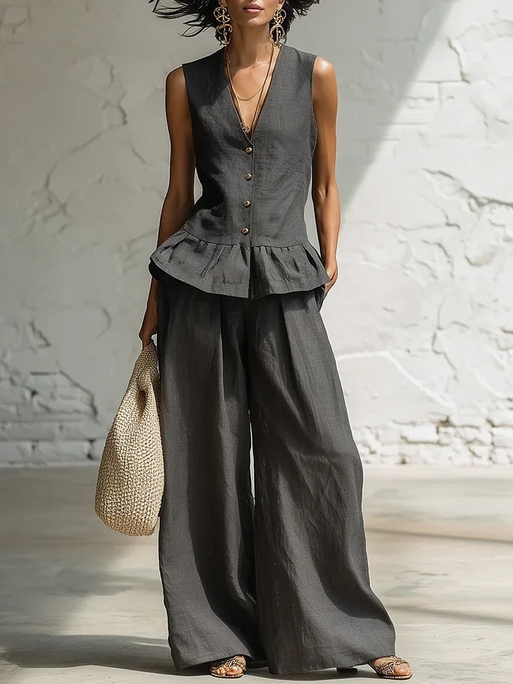 Damen lässiger Jumpsuit mit peplum Schnitt und Knopfdetails EB