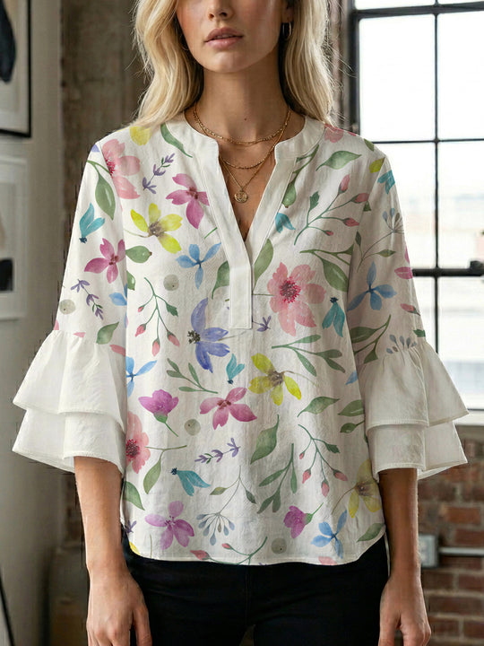 Damen Bluse mit voluminösen Ärmeln und floralem Design EB