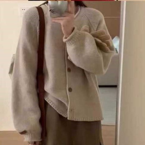 Damen Strickjacke mit asymmetrischem Schnitt und großzügigen Ballonärmeln EB